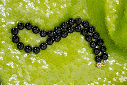 Why Gemstone Necklaces with Knots Between Each Bead Are Superior: The Art and Quality Behind Hand Knotting on Silk Cord