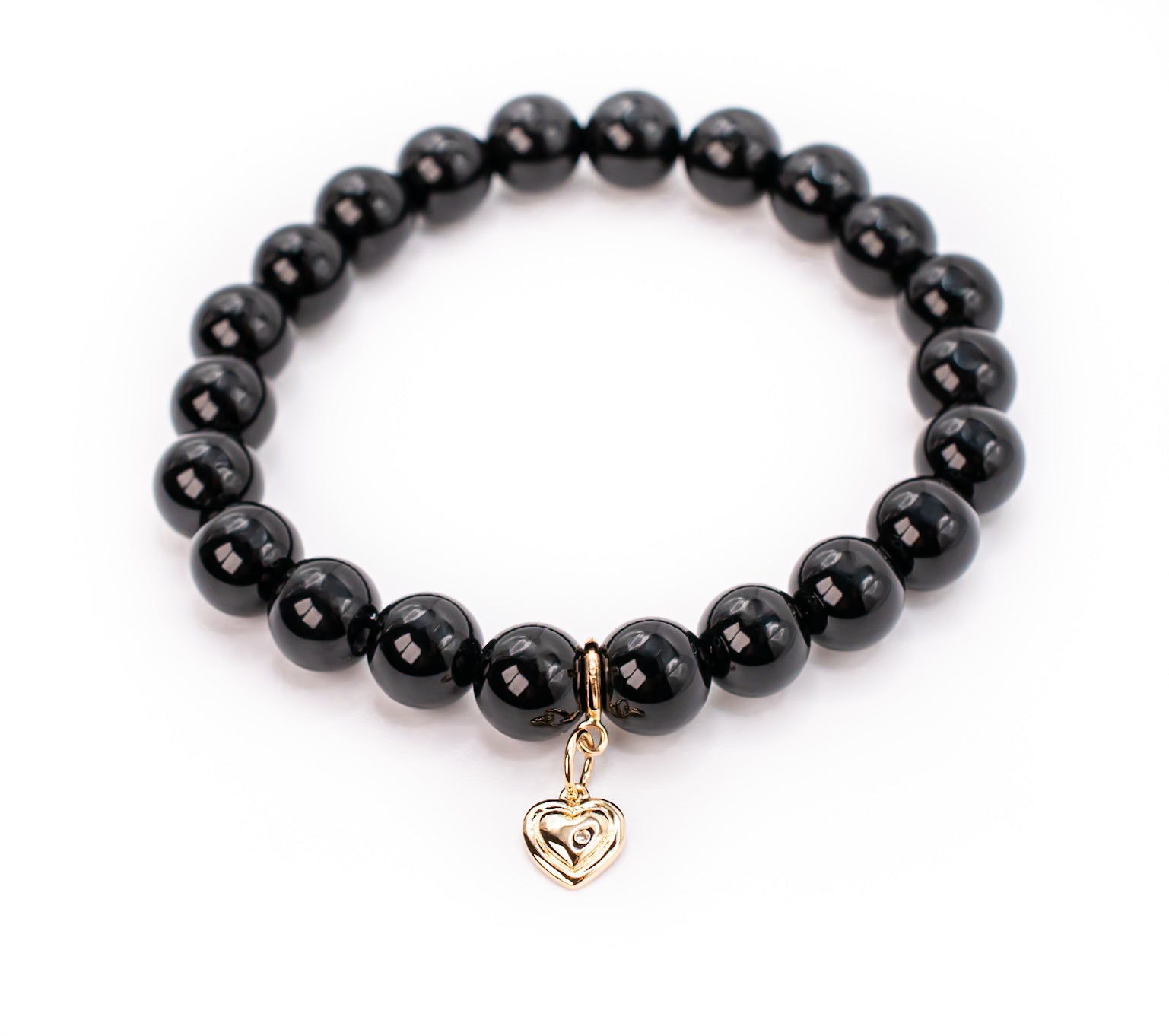 14K Yellow Gold and Diamond Puffy Heart on Black Onyx