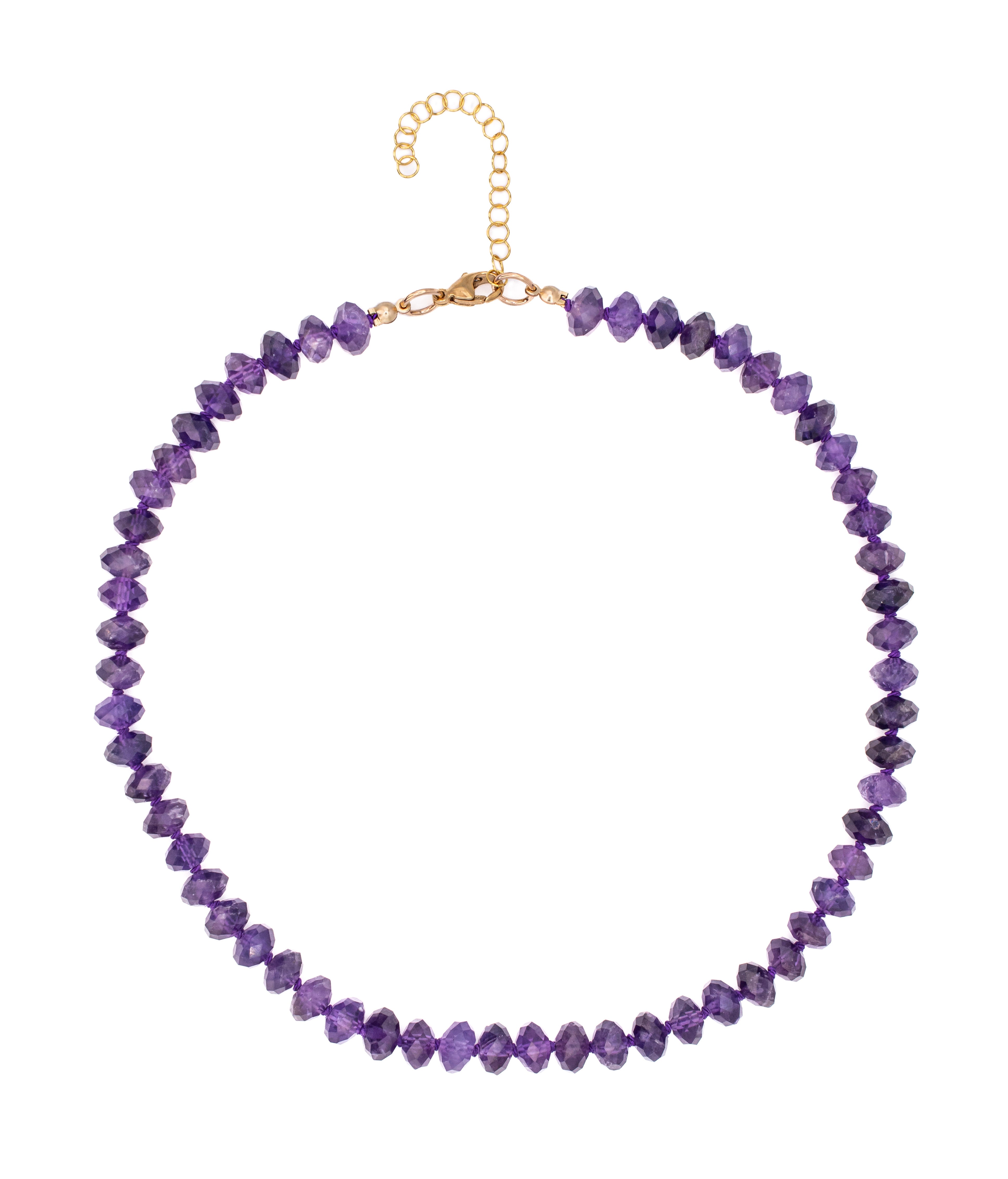 Purple beaded necklace on a white background