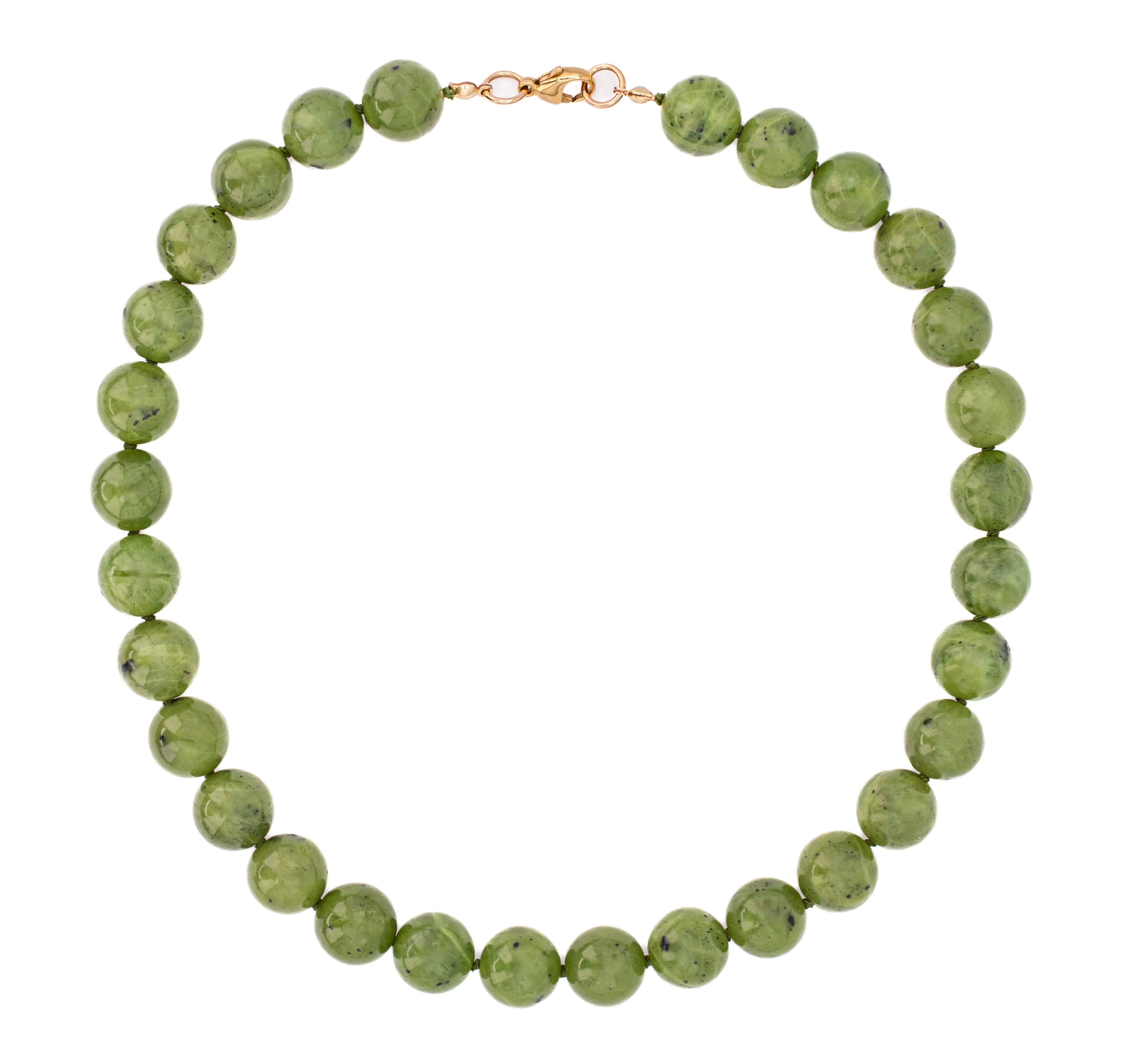 Green beaded necklace with a gold clasp on a white background