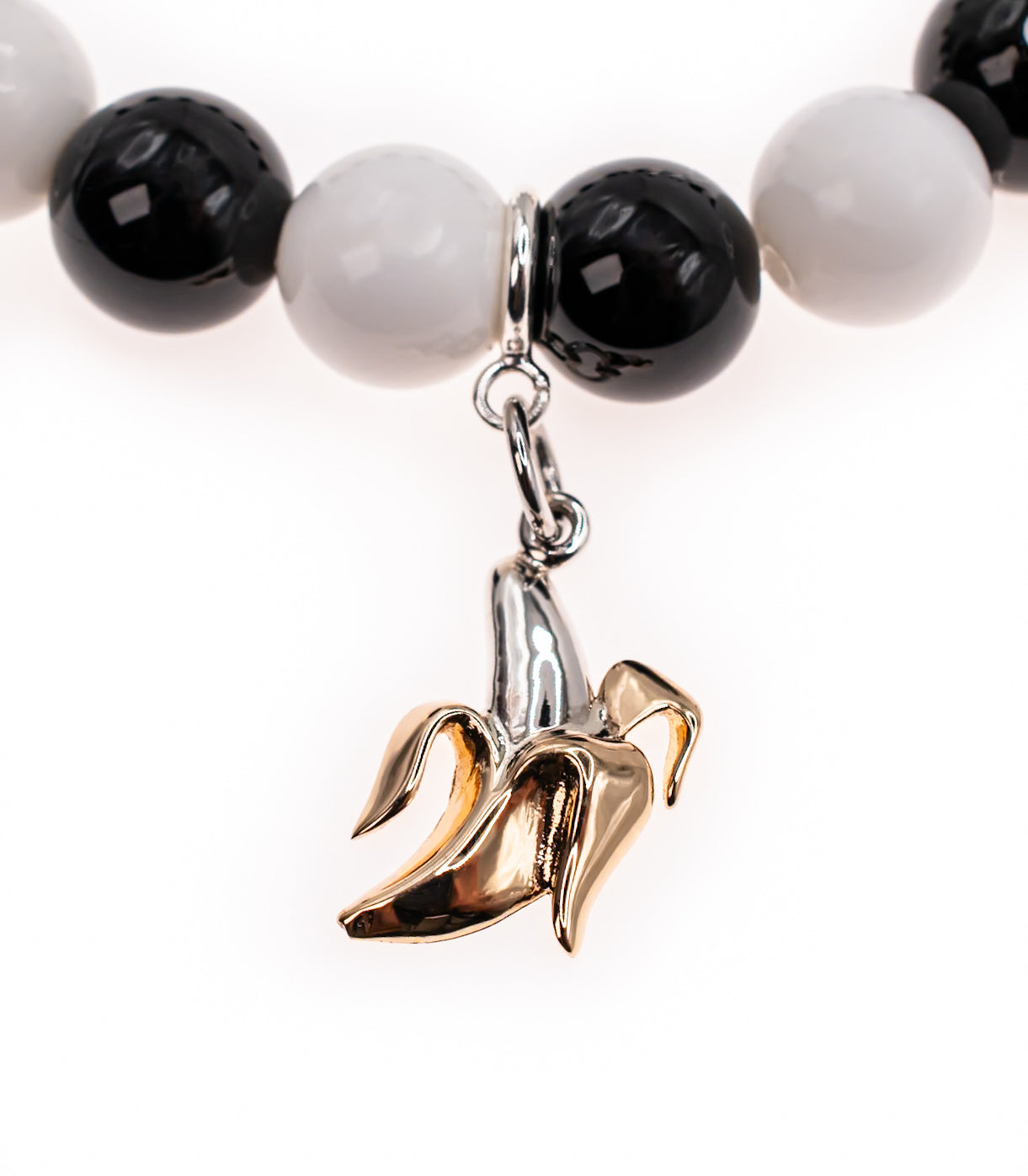 Sterling Silver Peeled Banana on Black Onyx and White Shell